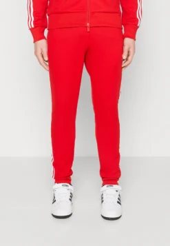 Adidas Originals Unisex - Trainingsbroek - Better Scarlet/White
